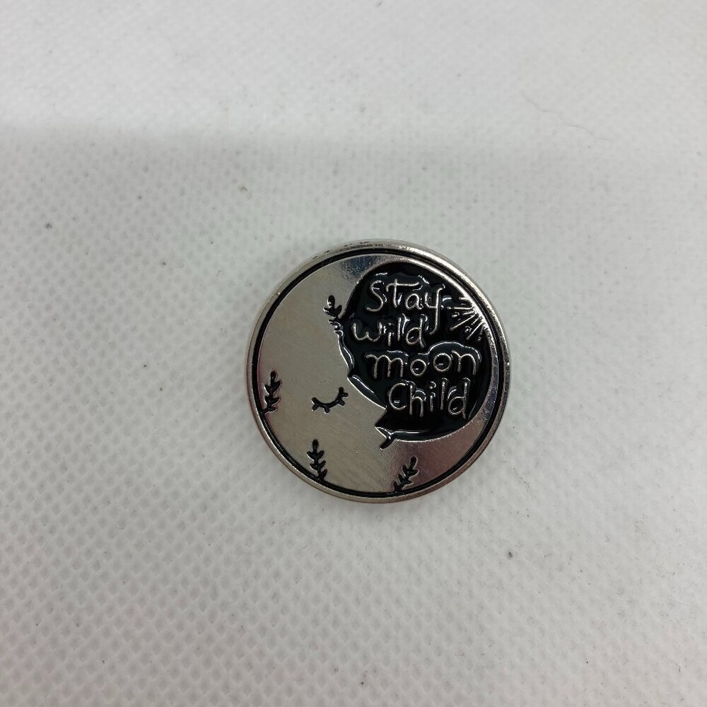 New “Stay wild moon child” pin